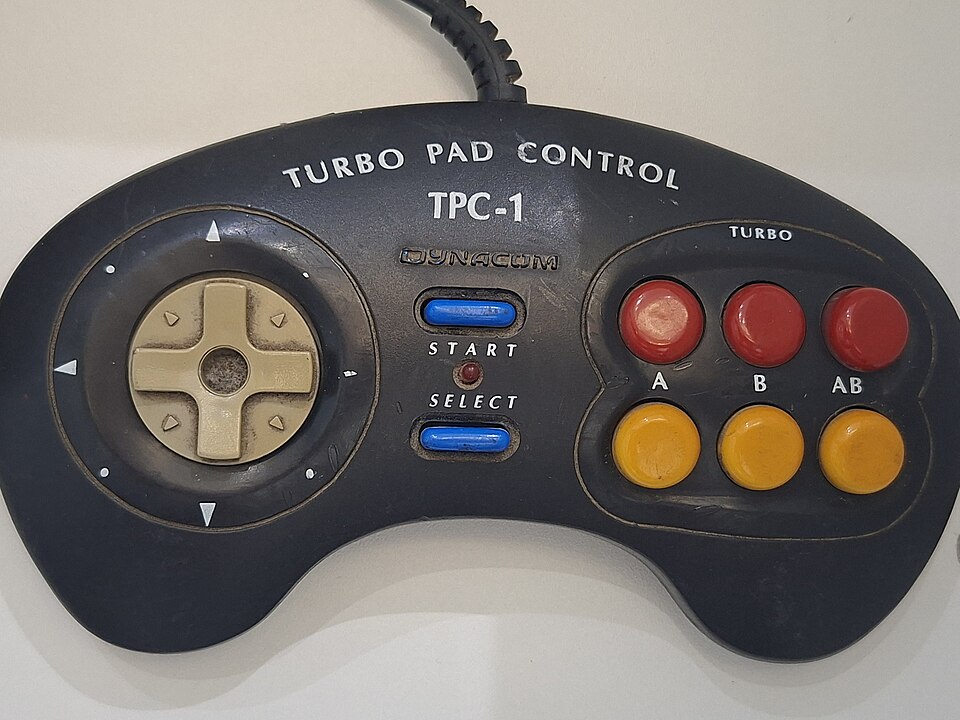 Controle Turbo Pad Control TPC-1 da Dynacom com direcional, Start, Select e botões A, B, AB e turbo
